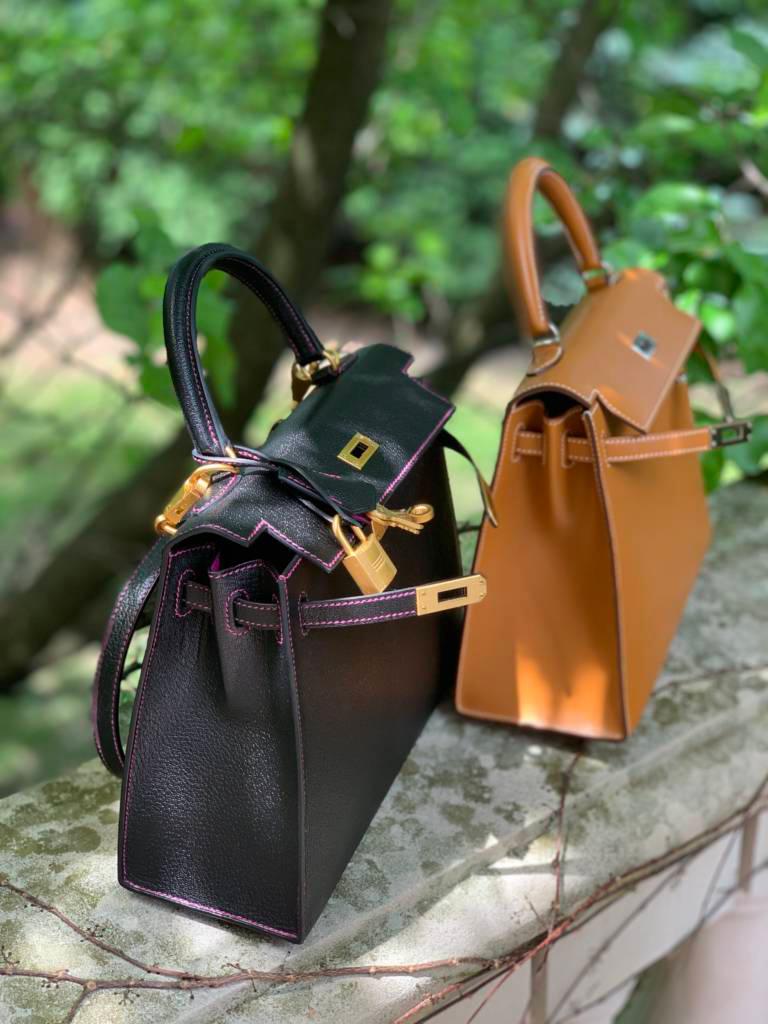 Both Sellier style Kellys: Black chèvre special order Kelly 25 and a Butler leather Kelly 25
